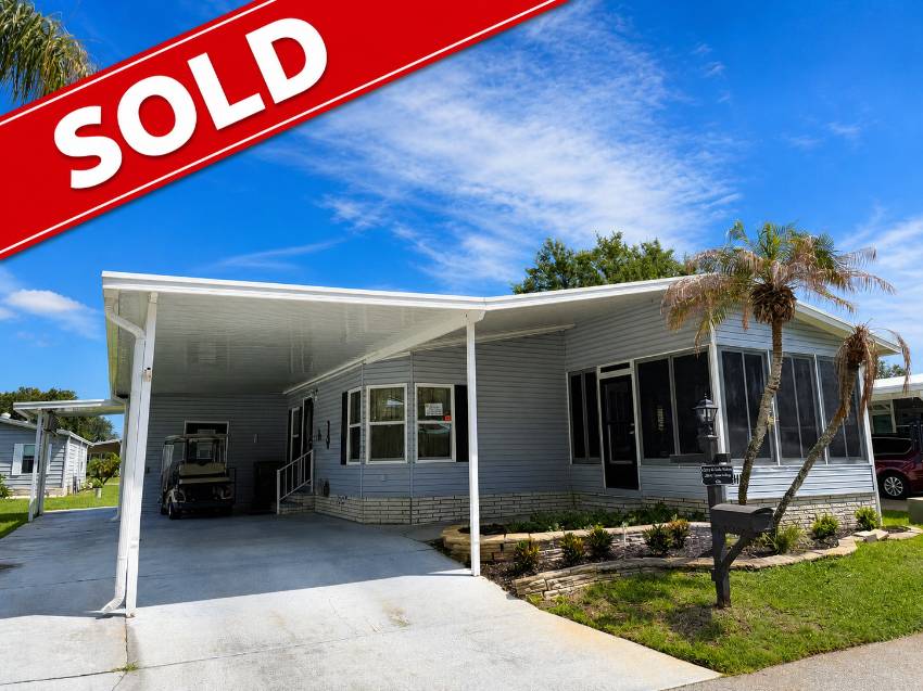 Winter Haven, FL Mobile Home for Sale located at 1011 Eagle Drive Swiss Golf & Tennis